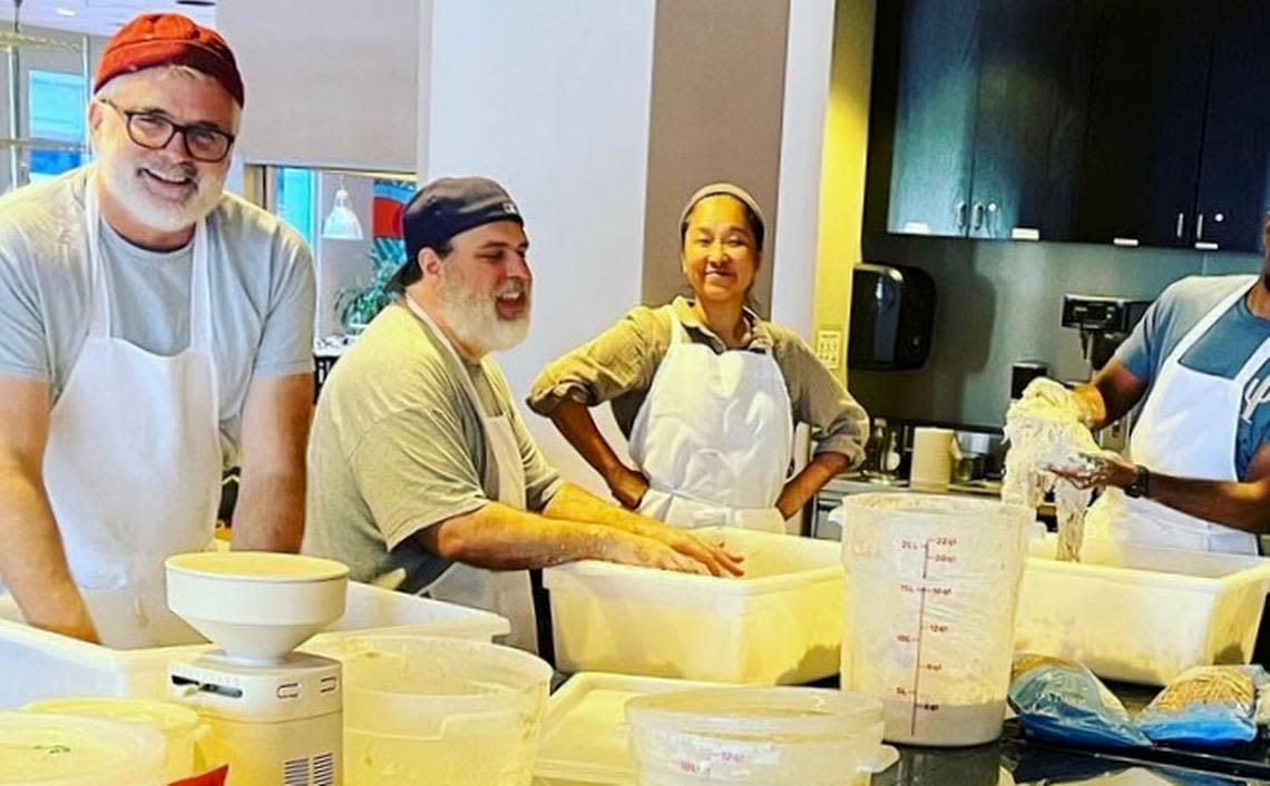 Trent Shaskan with the breadmakers at 3rd Street Market, a sourdough bar and bakery-cafe.