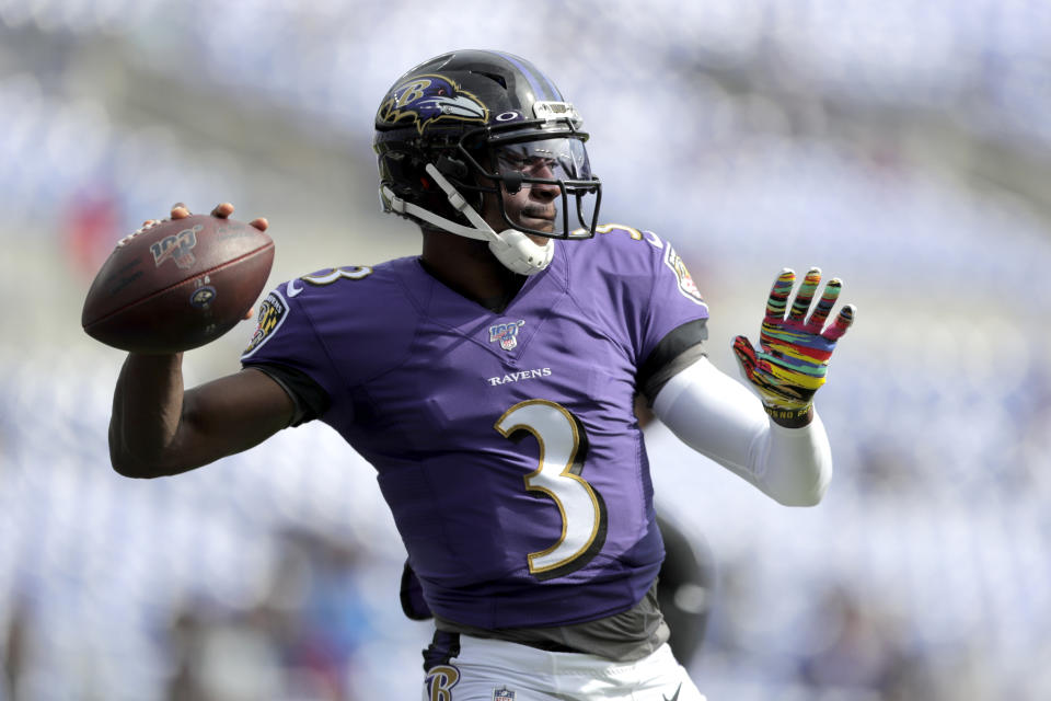 FILE - In this Oct. 13, 2019, file photo Baltimore Ravens quarterback Robert Griffin III works out prior to an NFL football game against the Cincinnati Bengals in Baltimore. It will be Griffin's first NFL start since 2016 on Sunday, Dec. 29. (AP Photo/Julio Cortez, File)