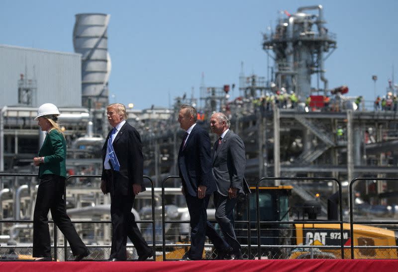 FILE PHOTO: U.S. President Trump walks with Sempra management at Cameron LNG Export Facility in Hackberry, Louisiana
