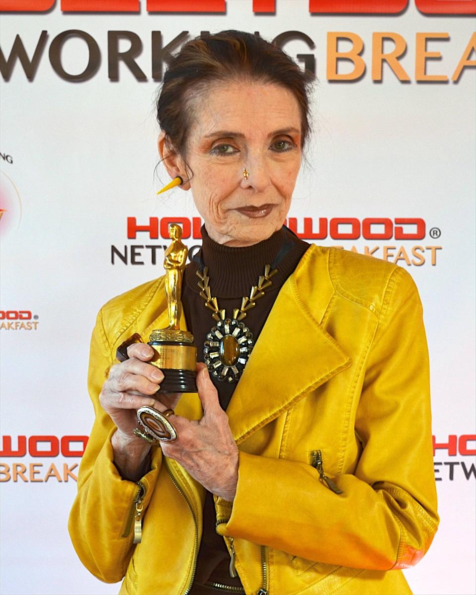 O'Brien at a 2014 event holding the Juvenile Academy Award she won for her role in 'Meet Me in St. Louis' (Photo: Photoshot/Everett Collection)