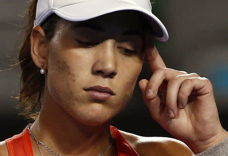 Spain's Garbine Muguruza reacts during her third round match against Czech Republic's Barbora Strycova at the Australian Open tennis tournament at Melbourne Park, Australia, January 23, 2016. REUTERS/Jason Reed