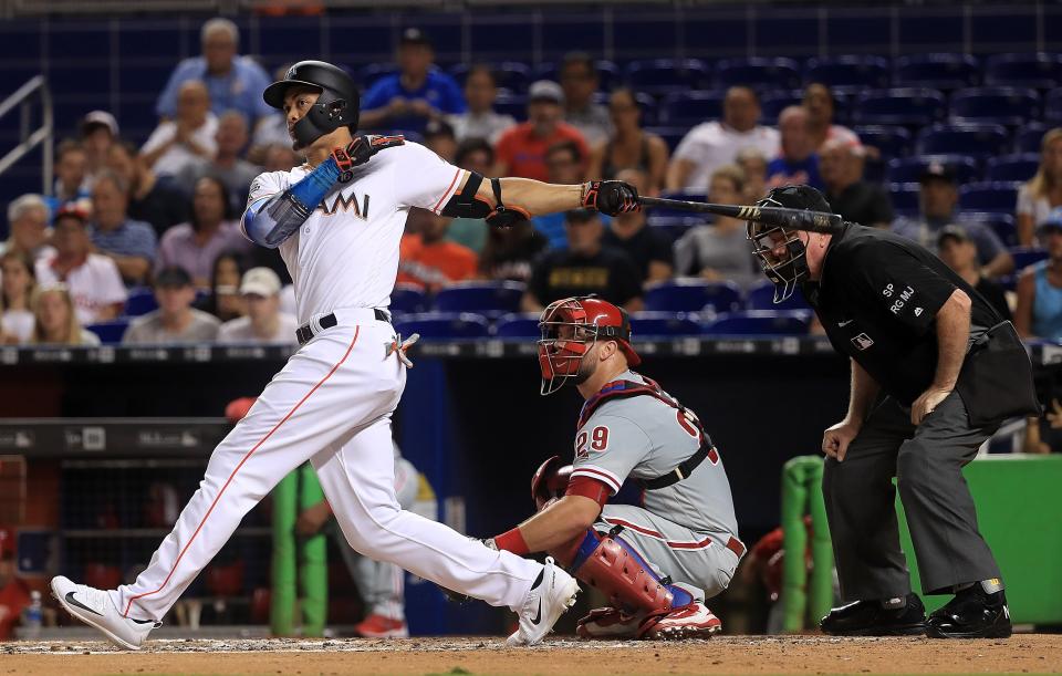 Giancarlo Stanton’s impressive pop might not be enough to earn him the NL MVP. (Photo by Mike Ehrmann/Getty Images)