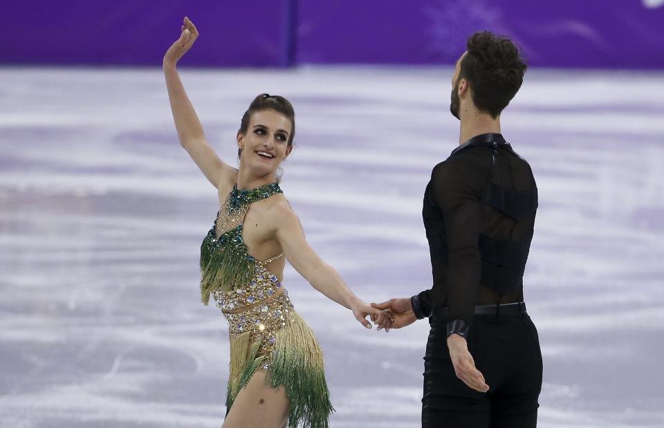 Gabriella Papadakis had a wardrobe malfunction during her Olympics routine with partner Guillaume Cizeron but kept her composure and finished her routine.