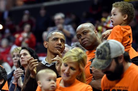 Mar 21, 2015; College Park, MD, USA; The President of the United States, Barack Obama looks on before a game between the Princeton Tigers and the Green Bay Phoenix during the first round of the women's NCAA Tournament at Xfinity Center. Derik Hamilton-USA TODAY Sports