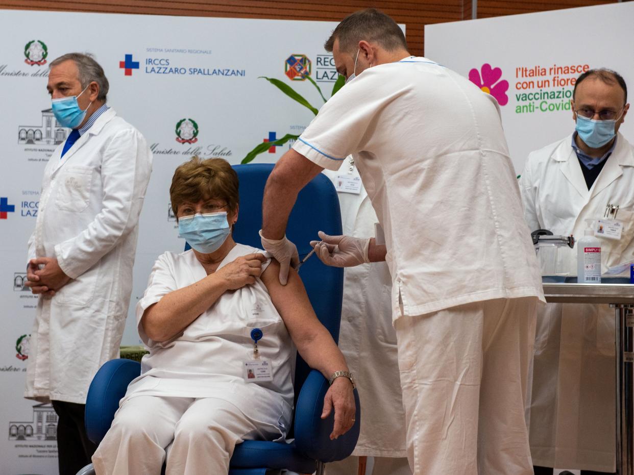 Maria Rosaria Capobianchi, one of the first recipients of Pfizer/BioNTech Covid-19 vaccine in Italy, receives her vaccination at the Spallanzani hospital in Rome (via REUTERS)