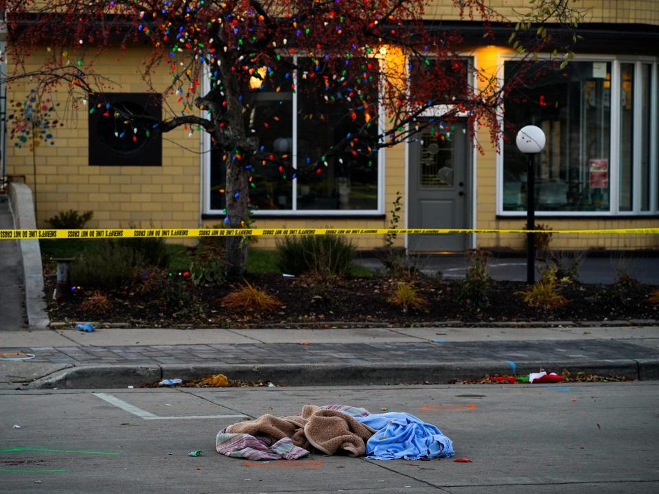 Clothing in the street in the aftermath of Waukesha SUV crash.