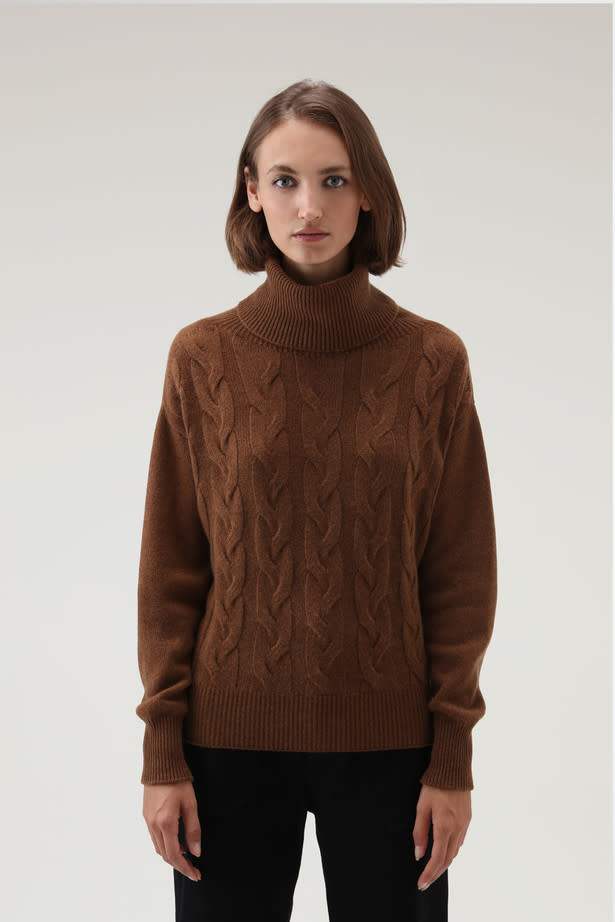 <p><a href="https://go.redirectingat.com?id=74968X1596630&url=https%3A%2F%2Fwww.woolrich.com%2Fus%2Fen%2Fcashmere-cable-knit-turtleneck-CFWWKN0200FRUF0668_7370.html&sref=https%3A%2F%2Fwww.townandcountrymag.com%2Fstyle%2Ffashion-trends%2Fg39829385%2Fonly-murders-in-the-building-fashion%2F" rel="nofollow noopener" target="_blank" data-ylk="slk:Shop Now;elm:context_link;itc:0;sec:content-canvas" class="link rapid-noclick-resp">Shop Now</a></p><p>Cashmere Cable-Knit Turtleneck Dark Camel</p><p>$325.00</p><p>woolrich.com</p>