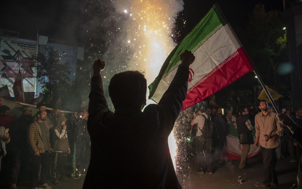 People gather in Tehran in support of the Islamic Revolutionary Guard Corps' attack on Israel on April 14