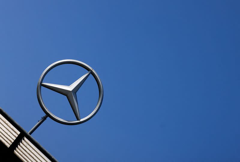 FILE PHOTO: The logo of Mercedes-Benz is seen outside a Mercedes-Benz car dealer in Brussels