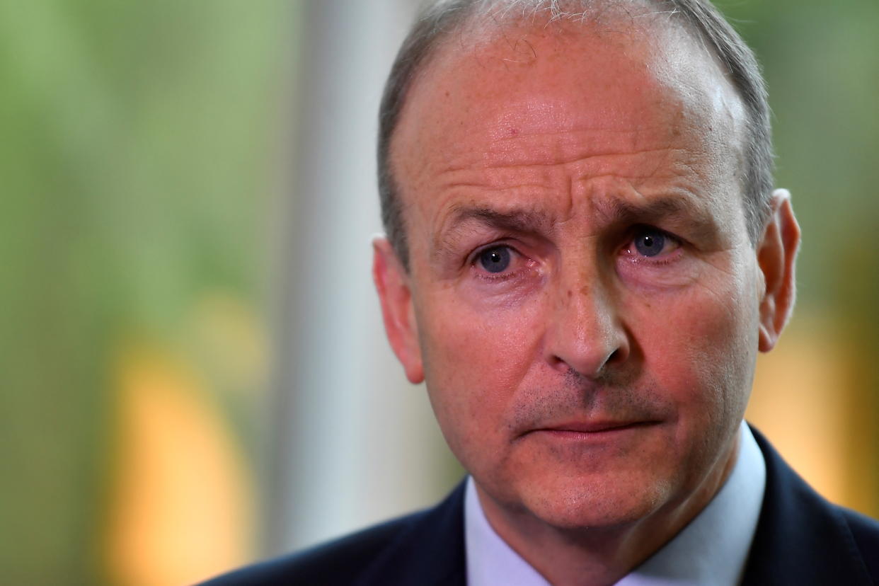 Ireland's (Prime Minister) Taoiseach Micheal Martin looks on during a news conference at the Grand Central Hotel after speaking to Northern Ireland party leaders regarding issues surrounding the Northern Ireland protocol and power sharing impasse, in Belfast, Northern Ireland, May 20, 2022. REUTERS/Clodagh Kilcoyne