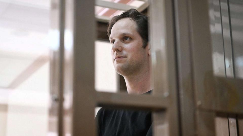 PHOTO: US journalist Evan Gershkovich, arrested on espionage charges, stands inside a defendants' cage before a hearing to consider an appeal on his extended detention at The Moscow City Court in Moscow on June 22, 2023. (Natalia Kolesnikova/AFP via Getty Images)