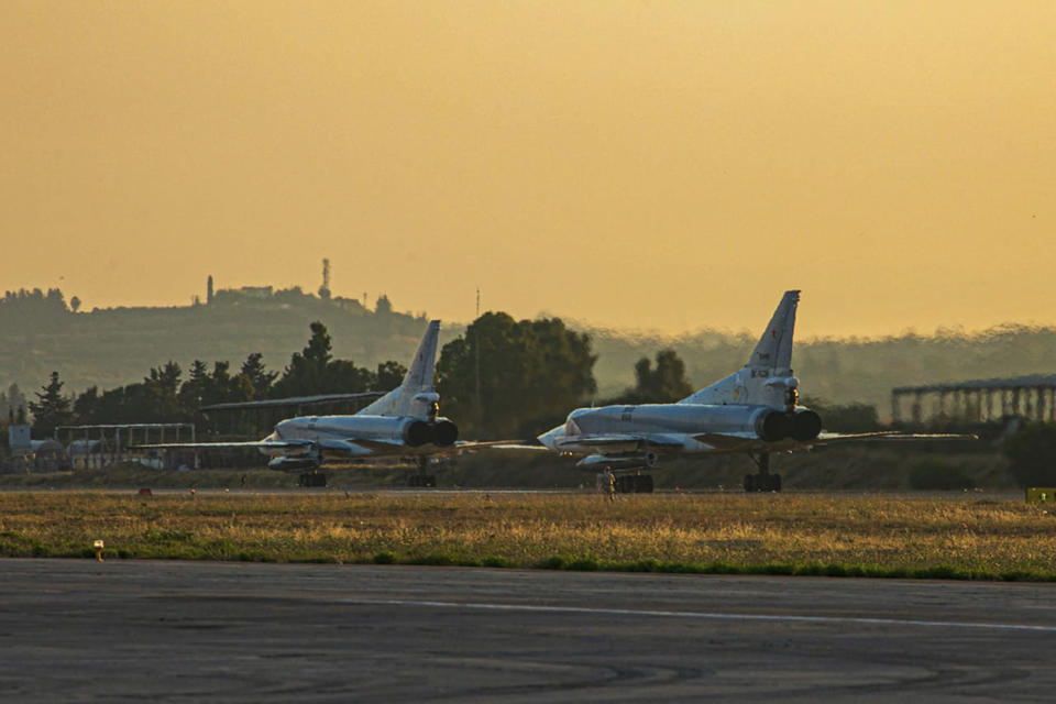 In this photo released by Russian Defense Ministry Press Service on Friday, June 25, 2021, a pair of the Russian air force's Tu-22M3 bombers taxi at the Hemeimeem air base in Syria. The Russian military on Friday launched sweeping maneuvers in the Mediterranean Sea featuring warplanes capable of carrying hypersonic missiles, a show of force amid a surge in tensions following an incident with a British destroyer in the Black Sea. (Russian Defense Ministry Press Service via AP)