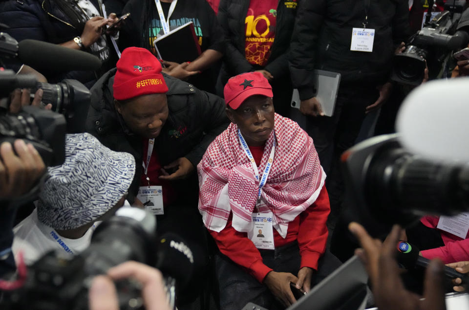 Economic Freedom Fighters (EFF) leader, Julius Malema, is surrounded by the press at the Results Operation Centre (ROC) in Midrand, Johannesburg, South Africa, Saturday, June 1, 2024. With nearly all votes counted in the elections, the African National Congress (ANC) party that freed South Africa from apartheid has lost its 30-year majority. (AP Photo/Themba Hadebe)