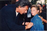 <p>Dustin Hoffman fixes his son Jake's denim jacket before they walk the red carpet of the MTV awards in 1992. </p>