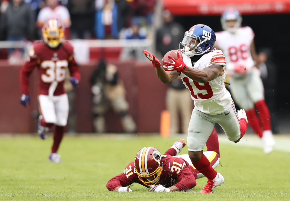 <p>Wide receiver Corey Coleman #19 of the New York Giants attempts to pull in a catch in the first quarter against the Washington Redskins at FedExField on December 9, 2018 in Landover, Maryland. (Photo by Rob Carr/Getty Images) </p>