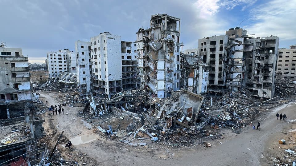 Destroyed buildings and roads seen after the Israel Defense Forces withdrew from the areas in Khan Younis on February 02, 2024. - Abdulqader Sabbah/Anadolu/Getty Images