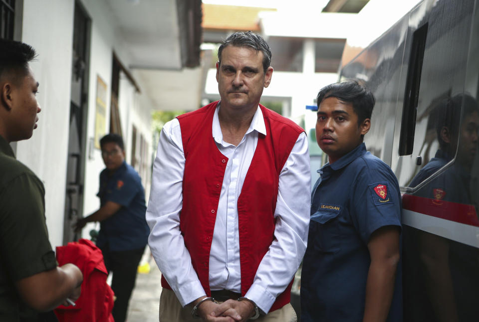 Australian Troy Smith, who is accused of drug possession, walks to a courtroom for his trial at Denpasar district court, Bali, Indonesia on Thursday, June 27, 2024. Indonesian police arrested Smith on April 30 after he was allegedly caught with methamphetamine in his hotel. (AP Photo/Firdia Lisnawati)