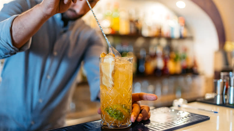 bartender using bar spoon 