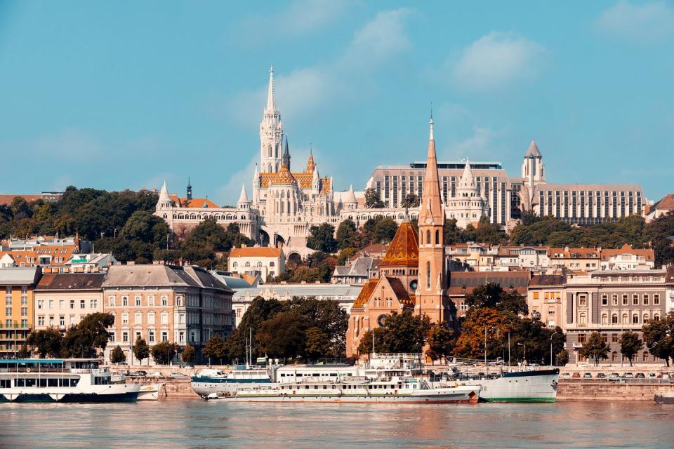 a city with a river and boats