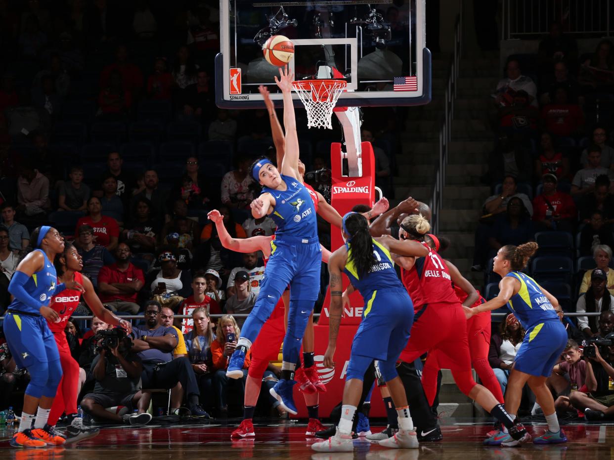 Megan Gustafson of the Dallas Wings grabs the rebound against the Washington Mystics on September 6, 2019 at the St. Elizabeths East Entertainment and Sports Arena in Washington, D.C.