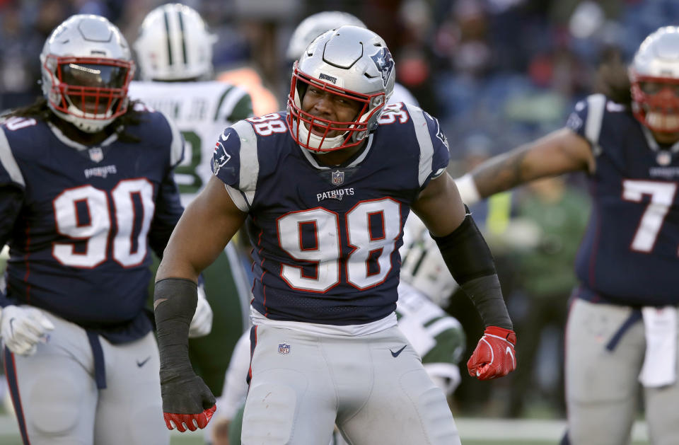 FILE - New England Patriots defensive end Trey Flowers reacts after sacking New York Jets quarterback Sam Darnold during the second half of an NFL football game, Sunday, Dec. 30, 2018, in Foxborough, Mass. The New England Patriots announced Tuesday, Aug. 8, 2023, that they have signed DE Trey Flowers. Flowers spent his first four seasons with New England from 2015 through the 2018 season and was a part of two Super Bowl wins with the Patriots in 2016 and 2018.(AP Photo/Charles Krupa, File)