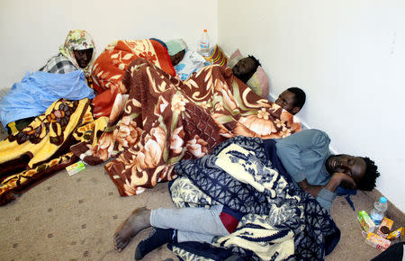 FILE PHOTO: Survivor migrants who were in a boat spending 12 days at sea without food or water are seen in Misrata, Libya December 4, 2018. REUTERS/Ayman al-Sahili/File Photo