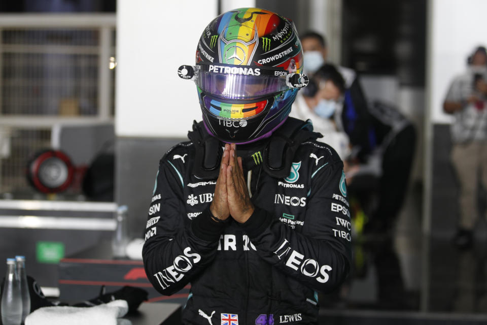 Mercedes driver Lewis Hamilton of Britain reacts after qualifying session qualifying session in Lusail, Qatar, Saturday, Nov. 20, 2021 ahead of the Qatar Formula One Grand Prix. (Hamad I Mohammed, Pool via AP)