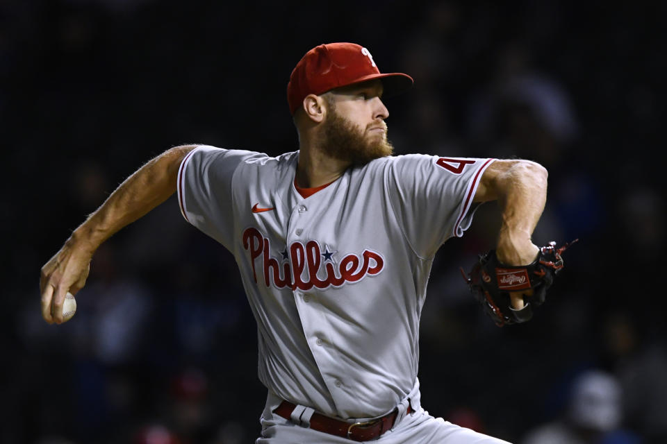 Philadelphia Phillies starter Zack Wheeler winds up during the first inning of the team's baseball game against the Chicago Cubs on Tuesday, Sept. 27, 2022, in Chicago. (AP Photo/Paul Beaty)