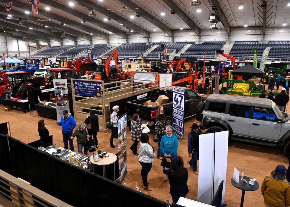 Visitors peruse the Farm, Ranch and Wildlife Expo Thursday in the Taylor Telecom Arena at the Taylor County Expo Center.