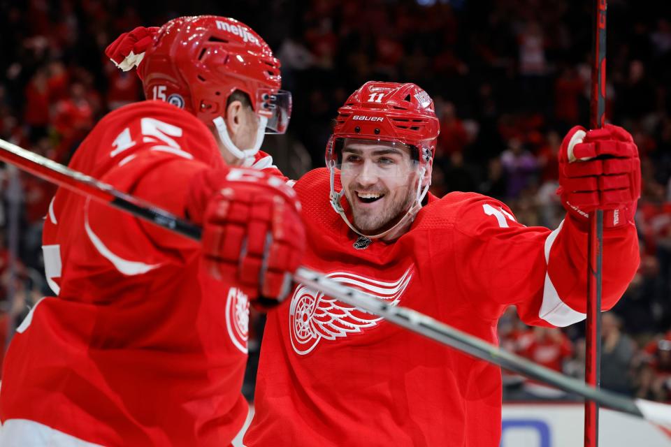 Red Wings right wing Filip Zadina, right, celebrates his goal in the second period with left wing Jakub Vrana on Tuesday, April 5, 2022, at Little Caesars Arena.