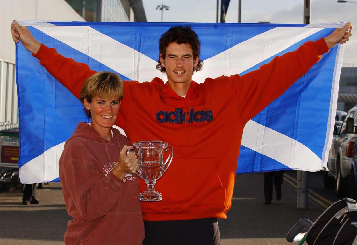 British tennis sensation Andrew Murray celebrates his victory in the boys' US Open with his mum Judy on his arrival back in Scotland. The 17-year-old beat Ukrainian Sergei Stakhovsky 6-4, 6-2 in the boys' final on Sunday at Flushing Meadows, New York. He is the first Briton to win the prestigious title, which has previously been lifted by Pat Cash, Stefan Edberg, Marcelo Rios and Andy Roddick. He dedicated his success to the victims of the Dunblane tragedy. The teenager was just eight when gunman Thomas Hamilton walked into his school and shot dead 16 children and a teacher.   (Photo by PA Images via Getty Images)