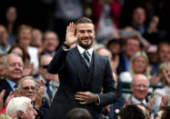 <p>Accompanied by his mum, Sandra, the footballing legend made sure he was suited and booted for his stop-off in the royal box. <i>[Photo: PA Images]</i></p>
