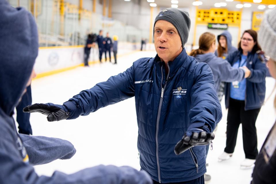 Scott Hamilton gives advice to participants during the Adaptive SkateFest at the Ford Ice Center in Antioch, Tenn., Saturday, July 6, 2019.