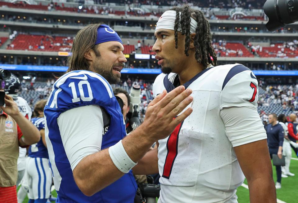 Sep 17, 2023; Houston, Texas, USA; Indianapolis Colts quarterback Gardner Minshew (10) talks with Houston Texans quarterback C.J. Stroud (7) after the game at NRG Stadium. Mandatory Credit: Troy Taormina-USA TODAY Sports