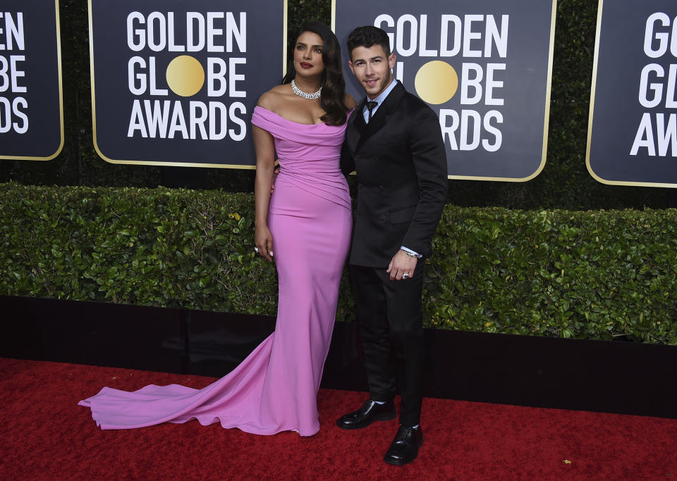 Priyanka Chopra, left, and Nick Jonas arrive at the 77th annual Golden Globe Awards at the Beverly Hilton Hotel on Sunday, Jan. 5, 2020, in Beverly Hills, Calif. (Photo by Jordan Strauss/Invision/AP)