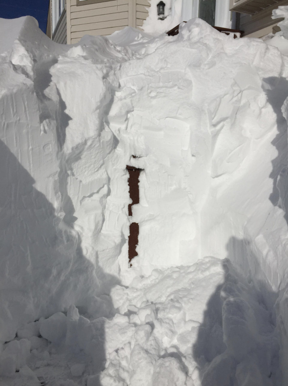 A walkway covered in snow