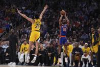 New York Knicks' Alec Burks (18) shoots over Indiana Pacers' Ben Sheppard (26) during the second half of Game 5 in an NBA basketball second-round playoff series, Tuesday, May 14, 2024, in New York. The Knicks won 121-91. (AP Photo/Frank Franklin II)