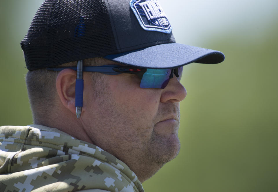 Tennessee Titans general manager Jon Robinson watches during NFL football minicamp Tuesday, June 15, 2021, in Nashville, Tenn. (George Walker IV/The Tennessean via AP, Pool)