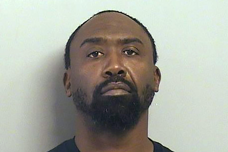 This undated photo provided by the Tulsa (Okla,), County jail shows Ananias Carson. Carson is one of two Tulsa police officers charged with helping conceal evidence of a shooting and the involvement of the brother of a former officer. Lt. Marcus Harper and Officer Ananias Carson were charged Tuesday, Nov. 2, 2021, as accessories after the fact in what police say was a gang-related shooting. (Tulsa County jail via AP)