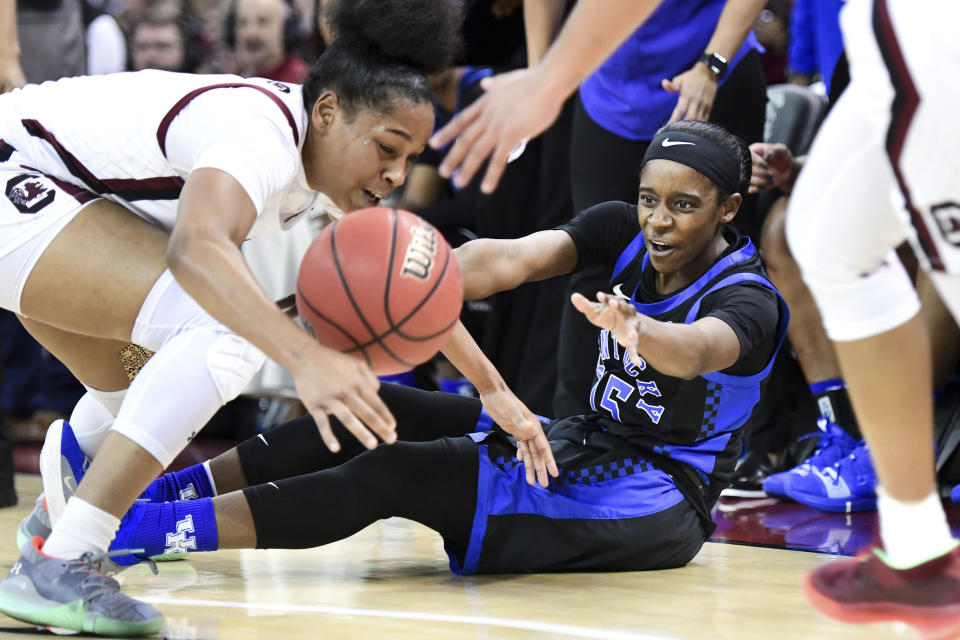 Kentucky guard Chasity Patterson (15) battles for possession against South Carolina guard Zia Cooke, left, during the first half of an NCAA college basketball game against Kentucky Thursday, Jan. 2, 2020, in Columbia, S.C. (AP Photo/Sean Rayford)