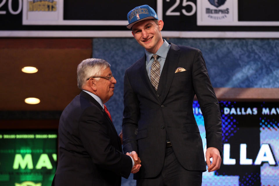 NEWARK, NJ - JUNE 28: Tyler Zeller (R) of the North Carolina Tar Heels greets NBA Commissioner David Stern (L) after he was selected number seventeen overall by the Minnesota Timberwolves during the first round of the 2012 NBA Draft at Prudential Center on June 28, 2012 in Newark, New Jersey. NOTE TO USER: User expressly acknowledges and agrees that, by downloading and/or using this Photograph, user is consenting to the terms and conditions of the Getty Images License Agreement. (Photo by Elsa/Getty Images)