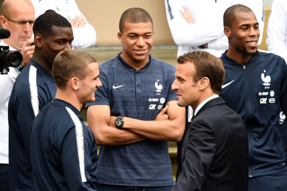 Emmanuel Macron has urged top European clubs to release their French players for a home Olympics  (AFP via Getty Images)