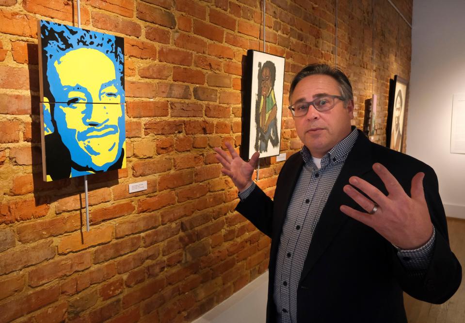 Jan 25, 2024; Tuscaloosa, Alabama, USA; An exhibition by art students at Central High hangs beside professional art at the Paul R. Jones Museum in Tuscaloosa. Museum Director Daniel White talks about the annual project that pairs the museum with a Tuscaloosa area school.