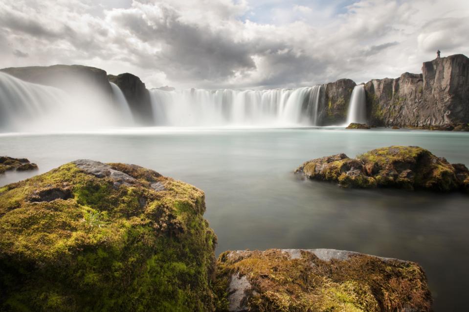 <p>There's even this beauty called "The Waterfall of the Gods" (or Goðafoss). History has it that in the year 999 a <a rel="nofollow noopener" href="http://www.visithusavik.com/attractions/godafoss-falls/" target="_blank" data-ylk="slk:holy man;elm:context_link;itc:0;sec:content-canvas" class="link ">holy man</a> made Christianity the official religion of Iceland. After his conversion, he threw Pagan statues into the waterfall, making it the official symbolic site of conversion.</p>