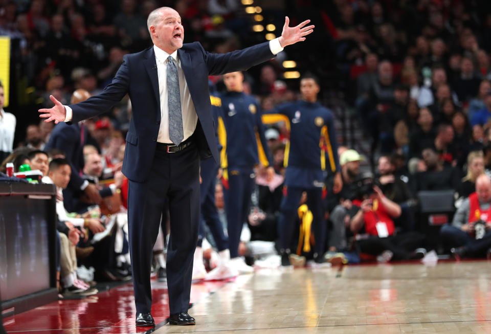 PORTLAND, OREGON - OCTOBER 23: Head Coach Michael Malone of the Denver Nuggets reacts against the Portland Trail Blazers in the fourth quarter during their season opener at Moda Center on October 23, 2019 in Portland, Oregon. NOTE TO USER: User expressly acknowledges and agrees that, by downloading and or using this photograph, User is consenting to the terms and conditions of the Getty Images License Agreement (Photo by Abbie Parr/Getty Images)