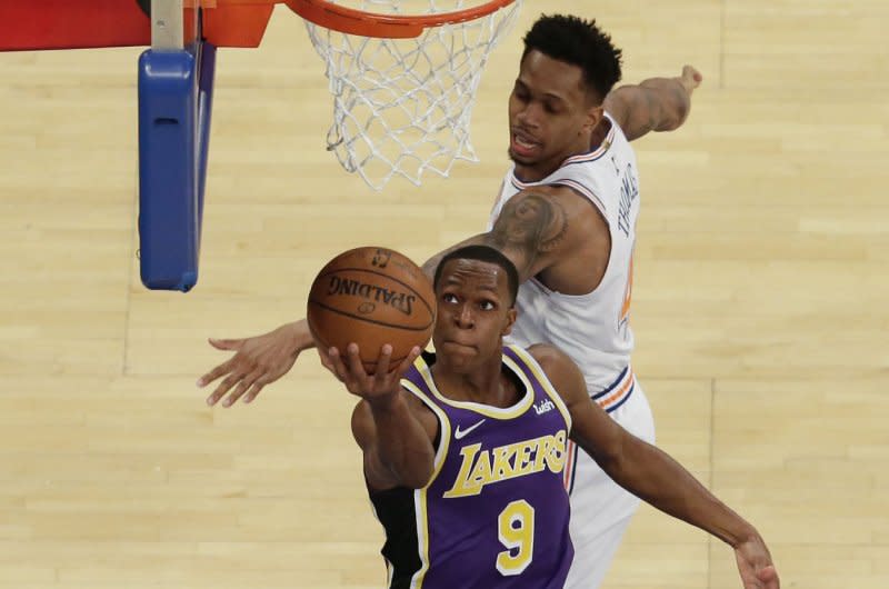 Former Los Angeles Lakers guard Rajon Rondo (L) won two championships during his long NBA career. File Photo by John Angelillo/UPI