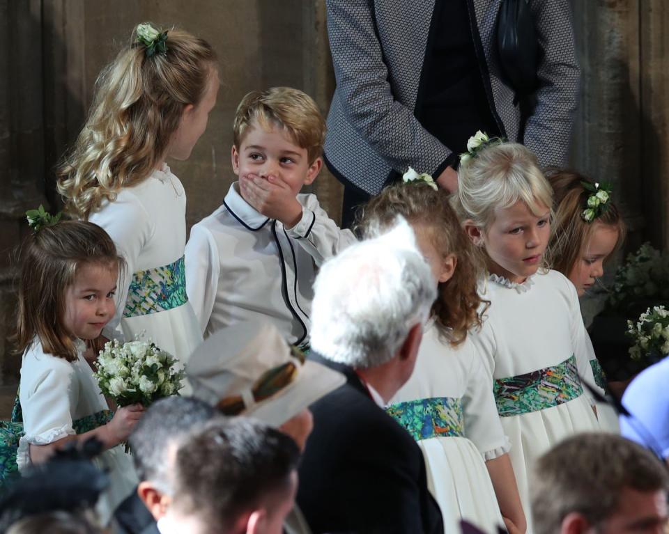 <p>While it's far from a major scandal, Prince George was caught on camera looking exceedingly cheeky at <a href="https://www.harpersbazaar.com/celebrity/latest/g23692122/princess-eugenie-royal-wedding-photos/" rel="nofollow noopener" target="_blank" data-ylk="slk:Princess Eugenie's wedding;elm:context_link;itc:0;sec:content-canvas" class="link ">Princess Eugenie's wedding</a>. Snapped next to known <a href="https://www.harpersbazaar.com/celebrity/latest/a23732776/prince-george-savannah-philips-eugenie-wedding/" rel="nofollow noopener" target="_blank" data-ylk="slk:troublemaker Savannah Phillips;elm:context_link;itc:0;sec:content-canvas" class="link ">troublemaker Savannah Phillips</a>, George couldn't stop giggling right before the service, especially when his partner in crime pretended to play the trumpet. These two are too much. </p>