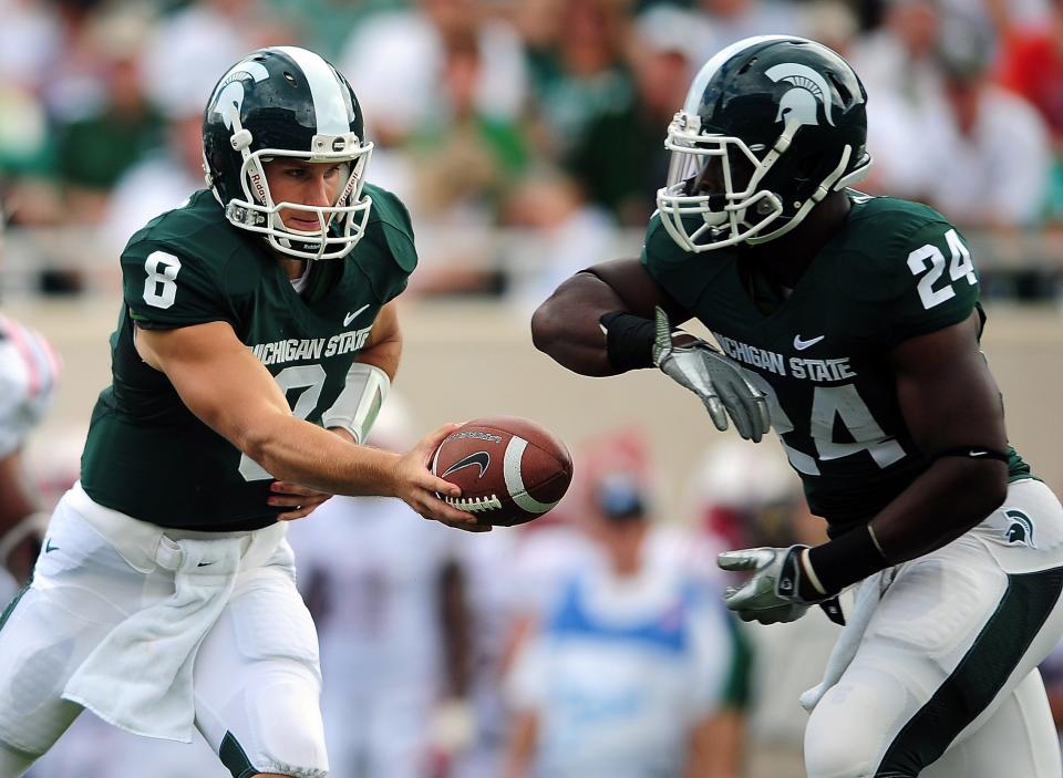 Kirk Cousins, left, and Le'Veon Bell helped MSU 22 wins in 2010 and 2011, before they each became two of the Spartans' better NFL players in recent history.