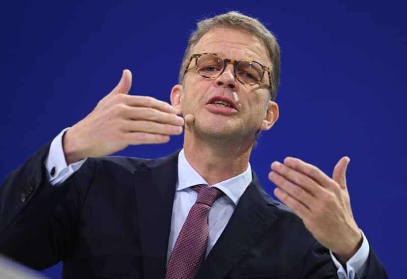 Christian Sewing, CEO of Deutsche Bank and President of the Association of German Banks (BdB), speaks at the opening conference of the "Euro Finance Week" at the Kongresshaus Kap Europa. Sewing has been elected to another three-year term as president of the influential BdB. Arne Dedert/dpa