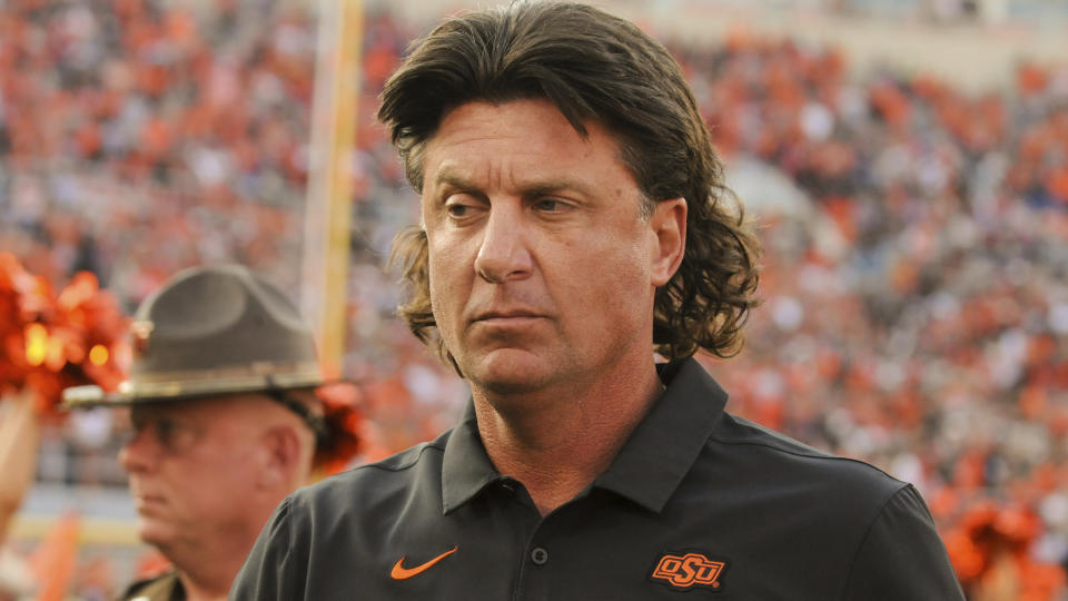 Oklahoma State head coach Mike Gundy takes the field prior to an NCAA college football game in Stillwater, Okla., Saturday, Sept. 28, 2019. (AP Photo/Brody Schmidt)